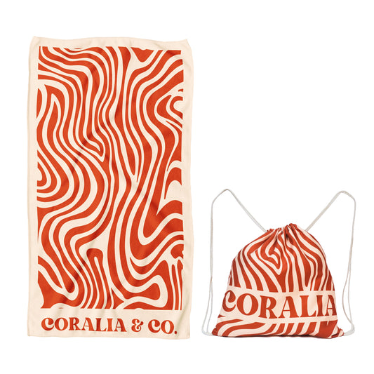 Coralia & Co. Coral Waves 2-in-1 Beach Towel Backpack - Front view with sand-free design and drawstring closure