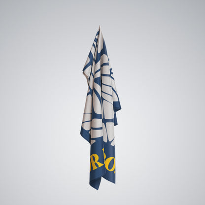 Coralia & Co. Large Quick Dry Microfiber Beach Towel - Ocean Breeze navy blue and beige stripes angle view