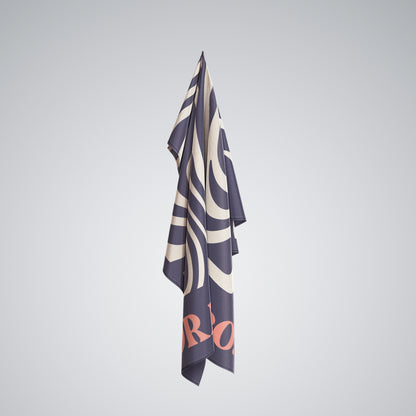 Coralia & Co. Large Quick Dry Microfiber Beach Towel - Ocean Breeze in navy blue, beige, coral color scheme