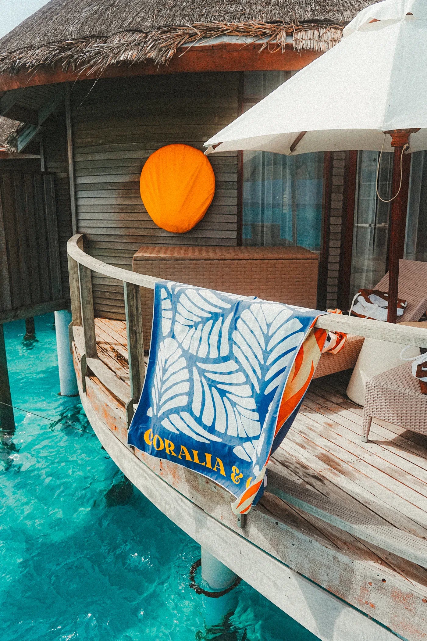 Coralia & Co. Large Quick Dry Microfiber Beach Towel - Twilight side view showcasing blue and white colors