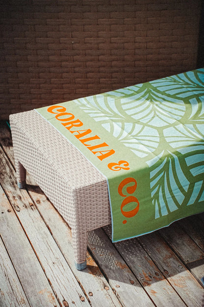 Coralia & Co. Large Quick Dry Microfiber Beach Towel - Mint Palm beach towel in vibrant mint green and light blue stripes