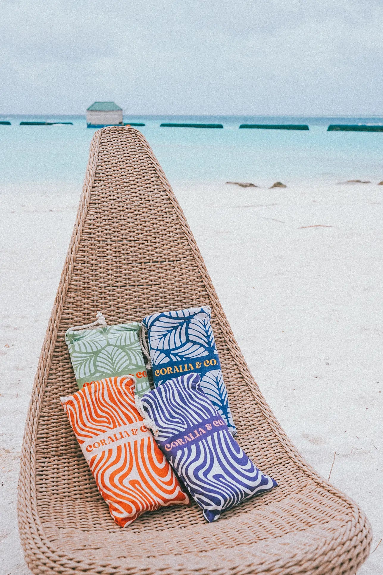 Coralia & Co. Large Quick Dry Microfiber Beach Towel - Twilight beach towel with blue, white, orange, purple, and green colors